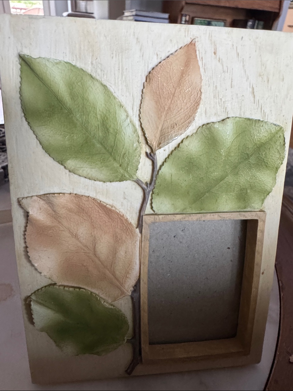 Natural embossed raised leaf motif picture frame measures 5x7 fits2x3 in photo